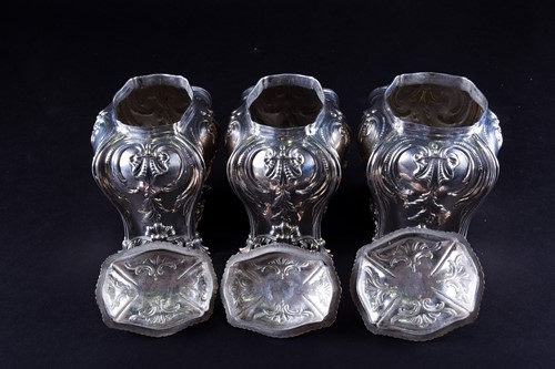 Lot 469 - A set of three early George III silver tea...