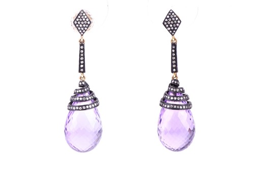 Lot 768 - A pair of diamond and amethyst drop earrings...