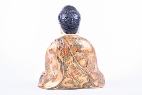 Lot 140 - A Japanese satsuma figure of Amida Buddha,...