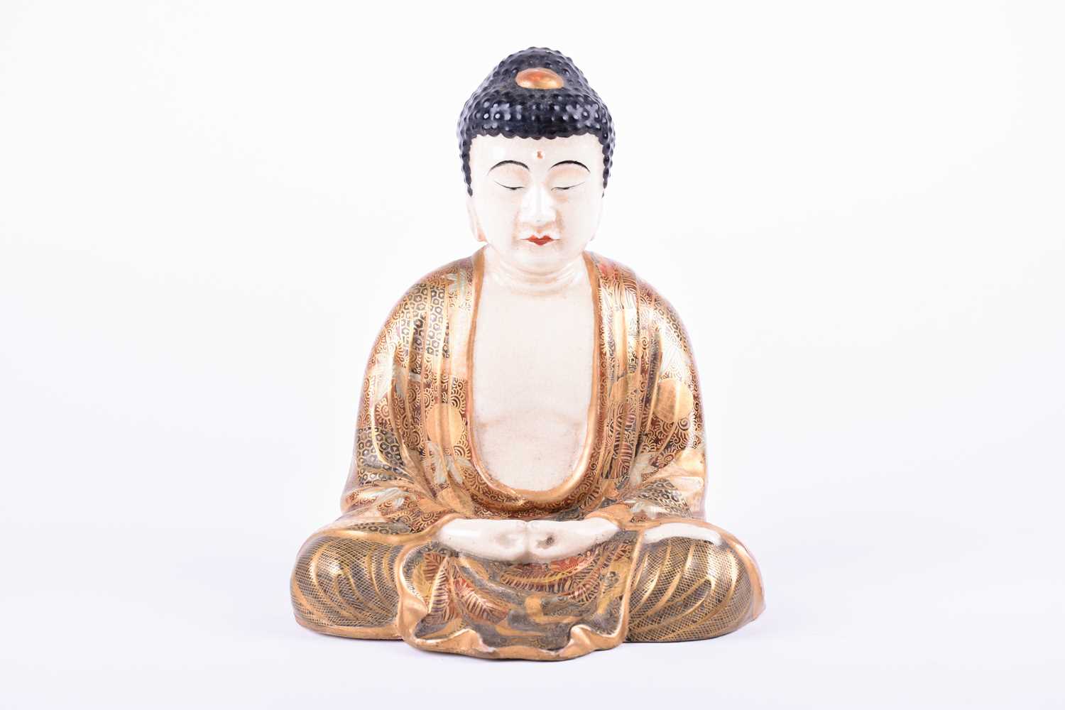 Lot 140 - A Japanese satsuma figure of Amida Buddha,...