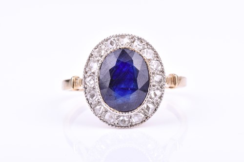 Lot 758 - A yellow metal, diamond, and kyanite ring set...