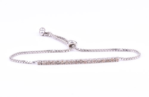 Lot 756 - A silver and cognac diamond bracelet set with...