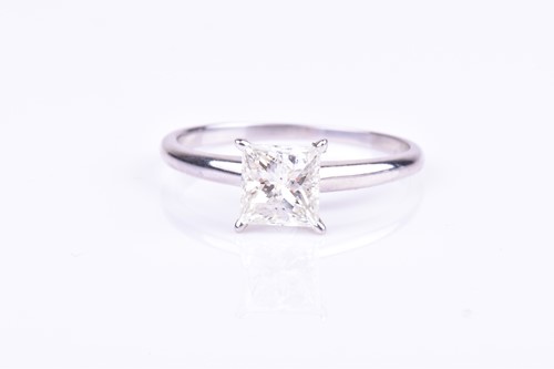 Lot 546 - A princess-cut single stone diamond ring the...