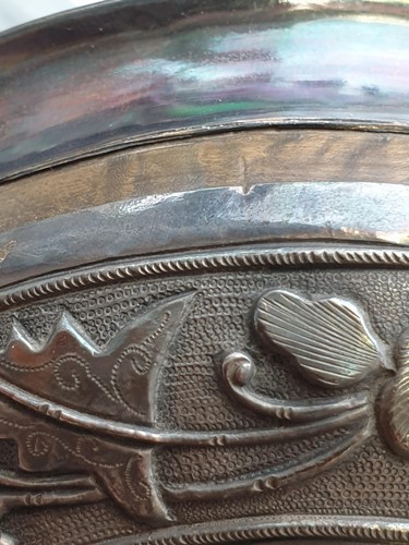 Lot 108 - A Tibetan silver metal and wood bowl, late...