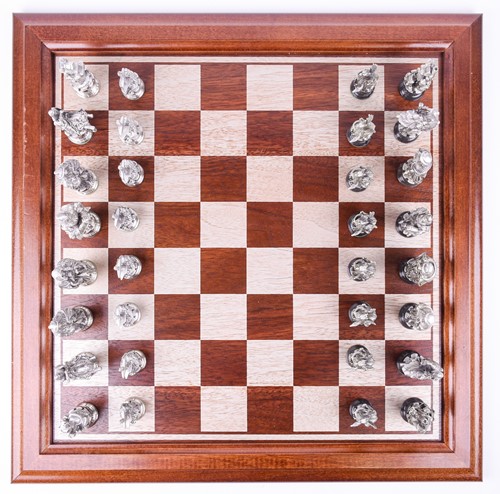 Lot 328 - A Danbury Mint Royal Selangor 'Camelot' chess...