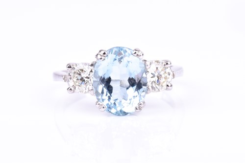 Lot 621 - A platinum, diamond, and aquamarine ring set...