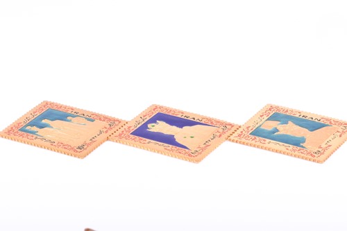 Lot 419 - A set of three Iranian gold and enamel...