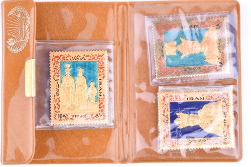 Lot 419 - A set of three Iranian gold and enamel...