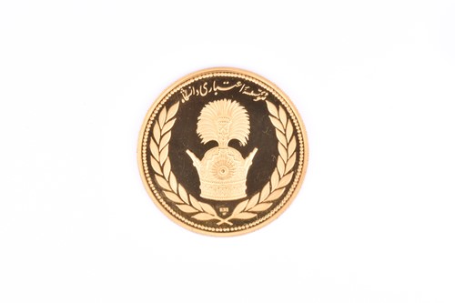 Lot 422 - An Iranian 22ct gold commemorative proof medal,...