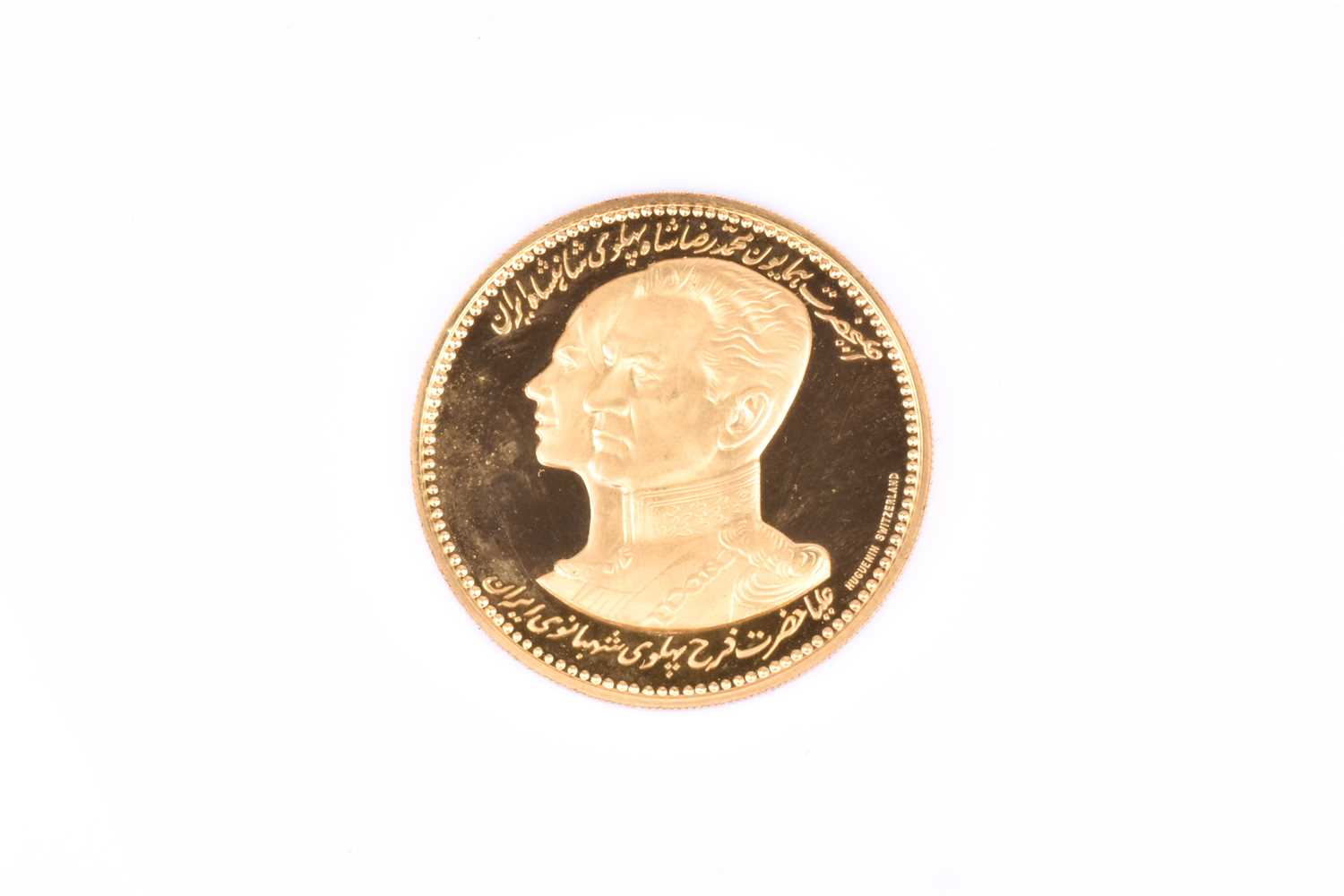 Lot 422 - An Iranian 22ct gold commemorative proof medal,...