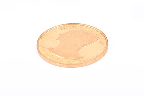 Lot 422 - An Iranian 22ct gold commemorative proof medal,...