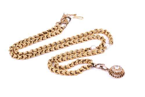 Lot 767 - A yellow metal rope-twist link necklace, the...