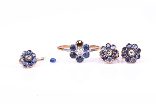 Lot 813 - An 18ct yellow gold, diamond, and sapphire...