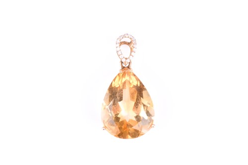 Lot 774 - A diamond and citrine drop pendant,  set with...