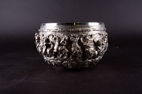 Lot 521 - An Indian silver bowl, typically relief...