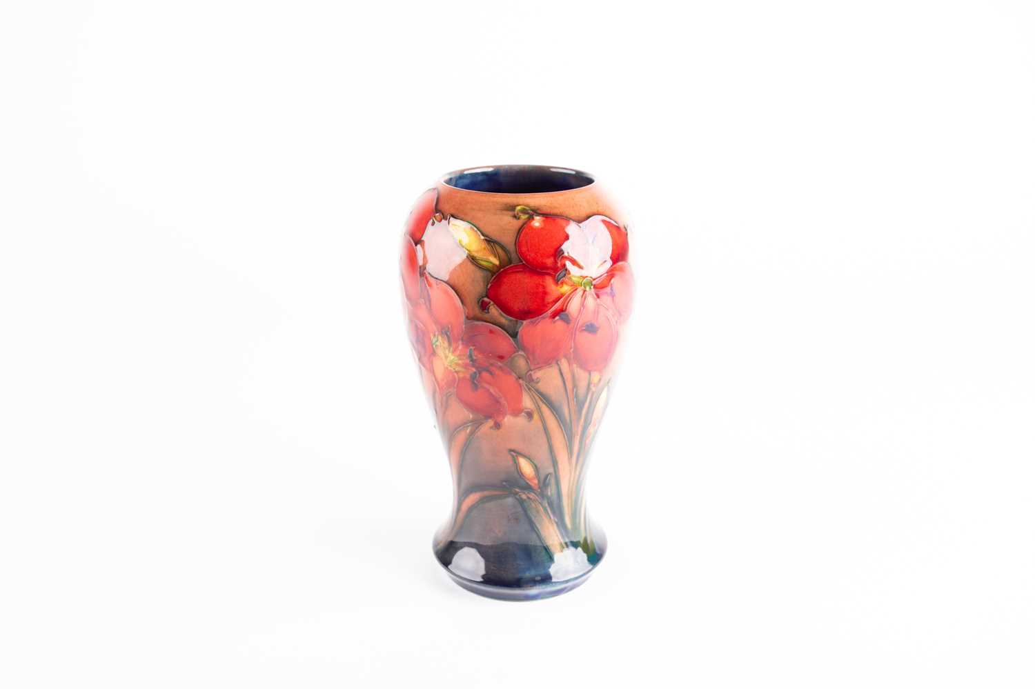 Lot 28 - A Moorcroft Flambé Lily pattern vase, early to...