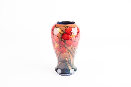 Lot 28 - A Moorcroft Flambé Lily pattern vase, early to...