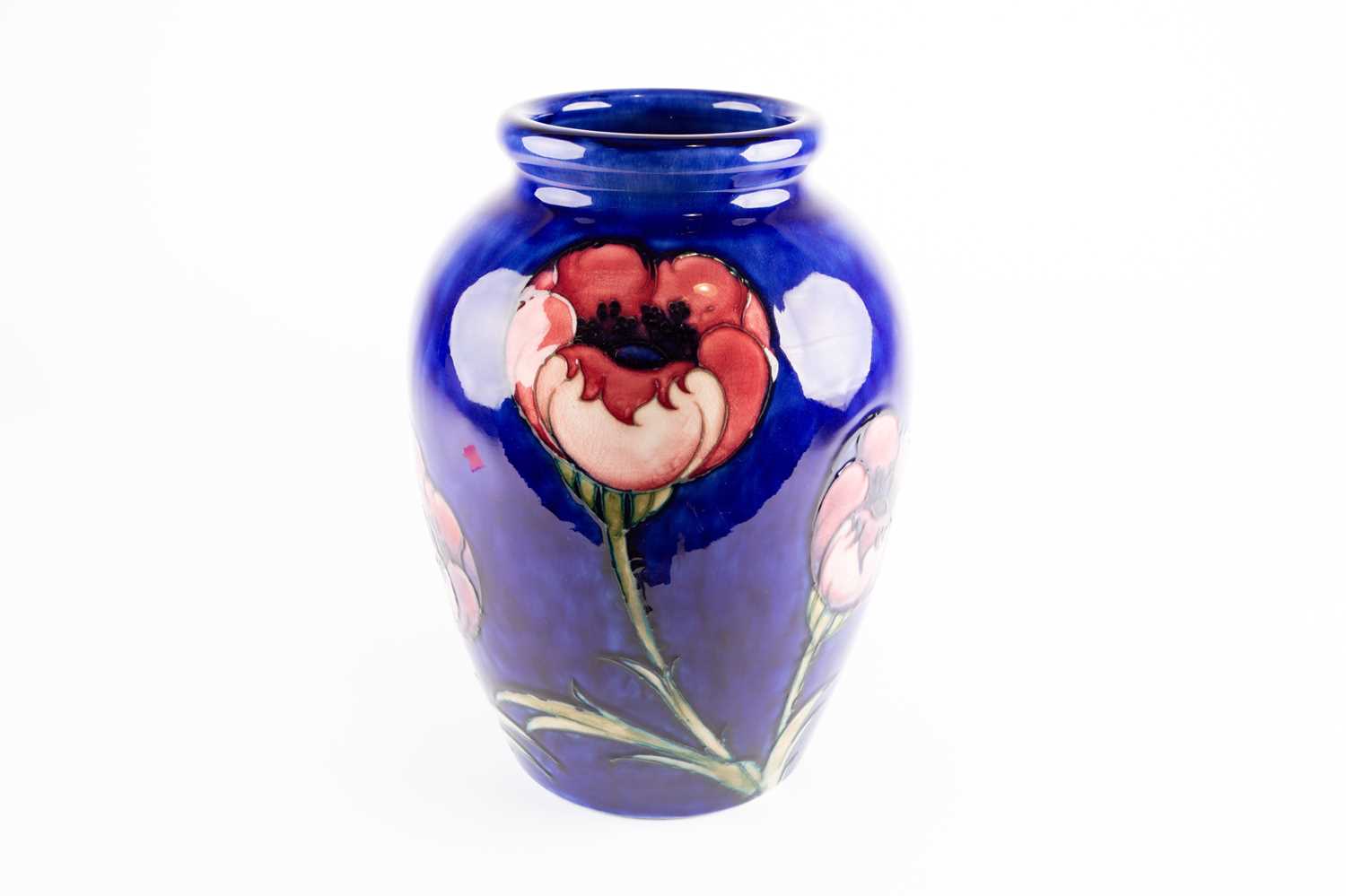Lot 11 - A large Moorcroft Poppy pattern vase, mid 20th...