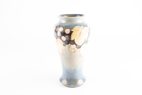 Lot 24 - A William Moorcroft Leaf & Berry pattern vase,...