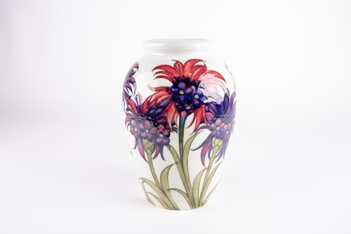 Lot 49 - A William Moorcroft 'Cornflower' pattern vase,...