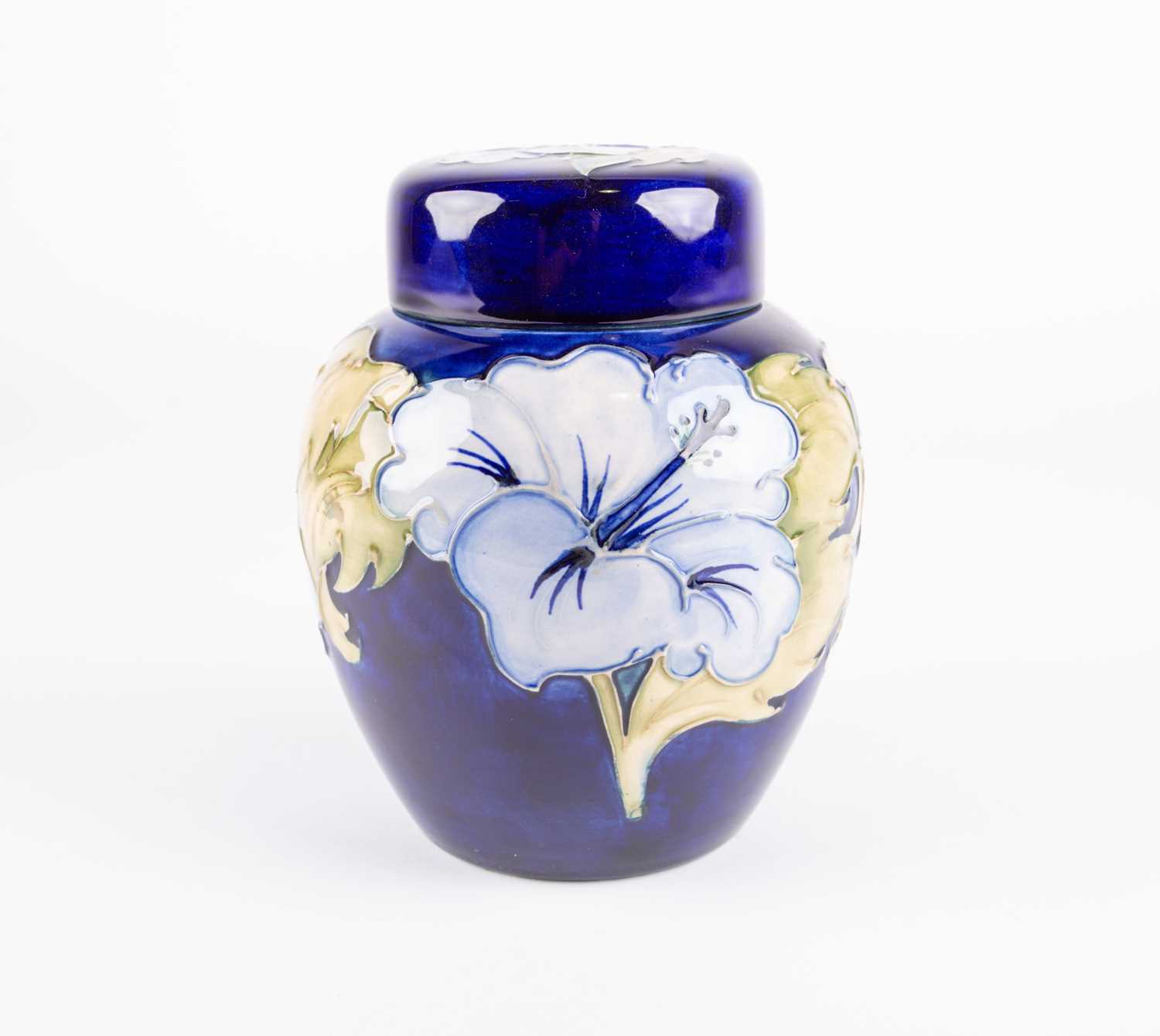 Lot 60 - A Moorcroft Hibiscus pattern ginger jar and...