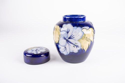 Lot 60 - A Moorcroft Hibiscus pattern ginger jar and...