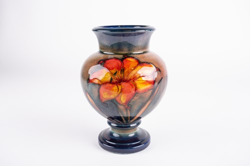 Lot 31 - A William Moorcroft flambe African Lily...