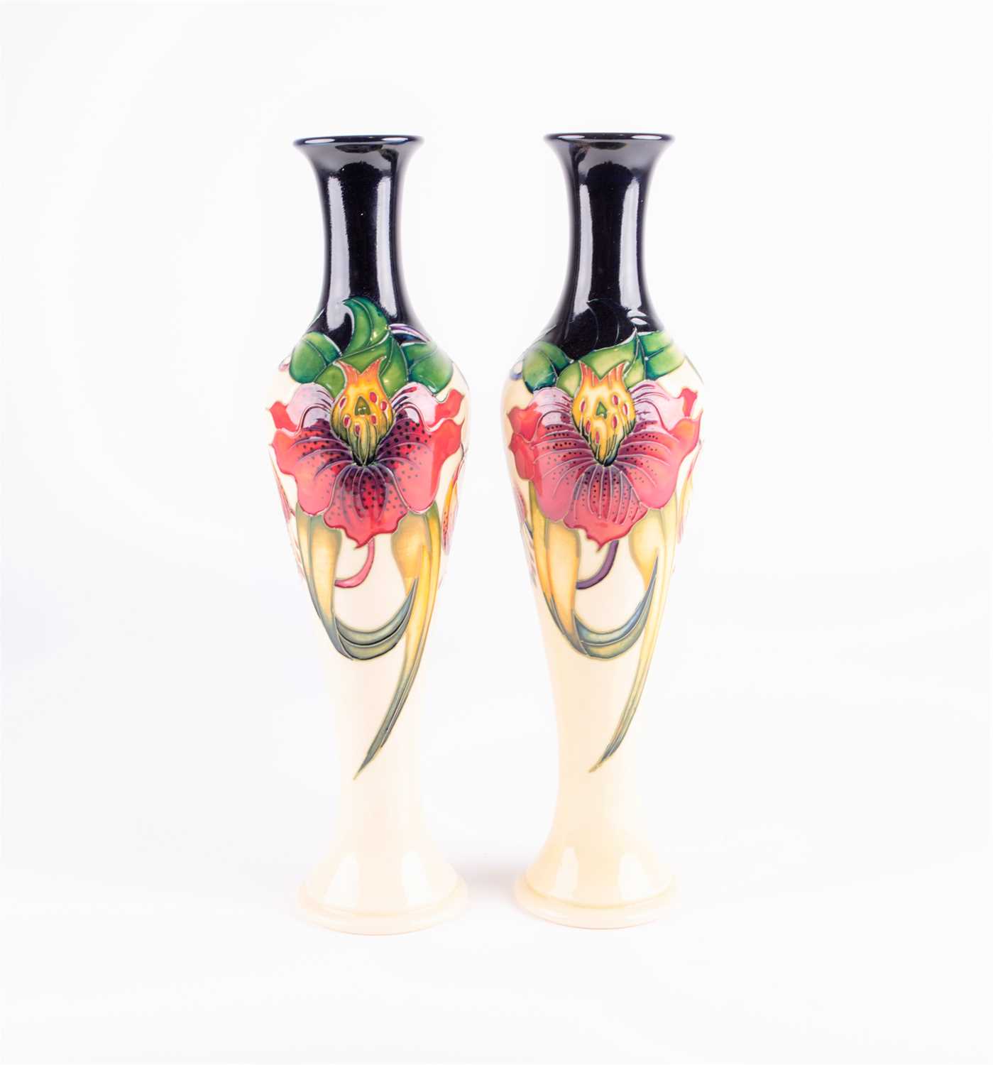 Lot 7 - A pair of Moorcroft 'Anna Lily' pattern vases,...