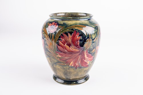 Lot 15 - A William Moorcroft 'Cornflower' pattern vase,...