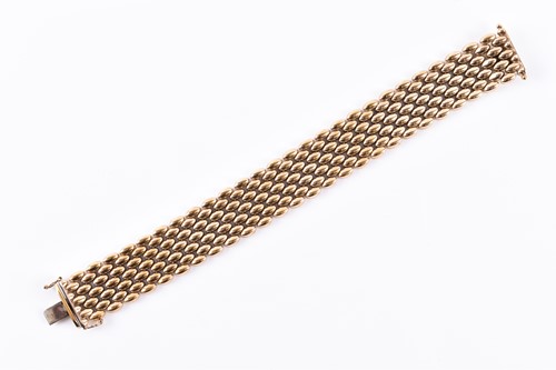 Lot 405 - A 9ct yellow gold bracelet, formed of...