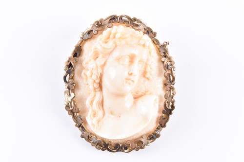 Lot 645 - A late 19th century carved ivory cameo style...