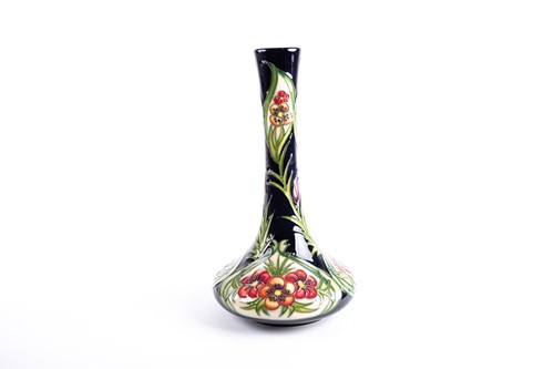 Lot 39 - A Moorcroft floral pattern vase designed by...