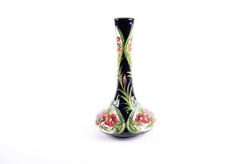 Lot 39 - A Moorcroft floral pattern vase designed by...