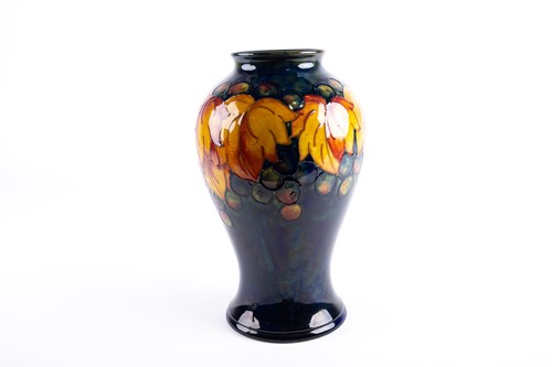 Lot 41 - A William Moorcroft flambé 'Leaf & Berry' vase,...