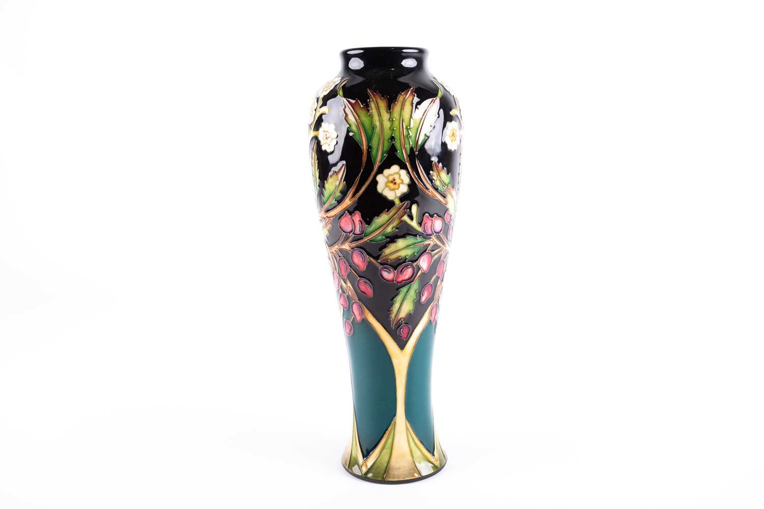 Lot 4 - A Moorcroft Flower & Berry pattern vase...