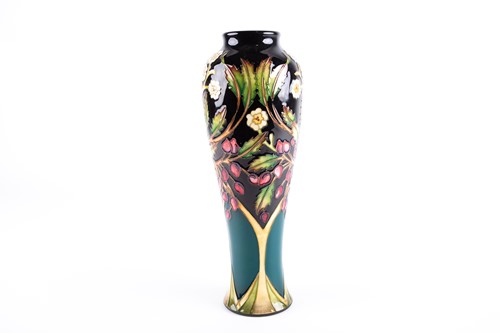 Lot 4 - A Moorcroft Flower & Berry pattern vase...