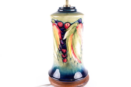 Lot 287 - A Moorcroft 'Leaf & Berry' pattern table lamp,...