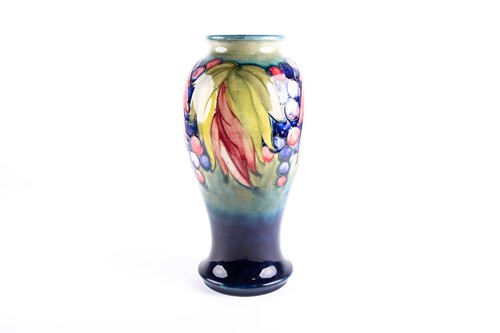 Lot 19 - An early Walter Moorcroft 'Leaf & Berry' vase,...