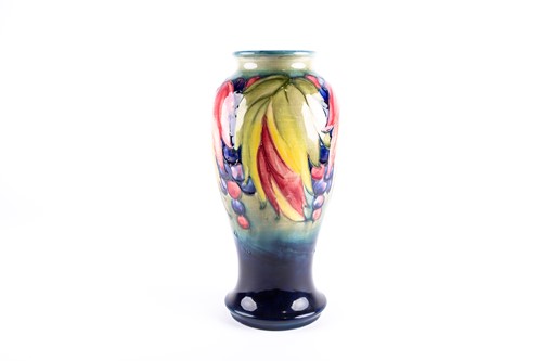 Lot 19 - An early Walter Moorcroft 'Leaf & Berry' vase,...