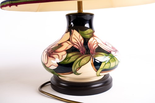 Lot 270 - A pair of Moorcroft 'Magnolia' pattern table...