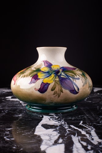 Lot 16 - A Walter Moorcroft 'Columbine' pattern vase,...