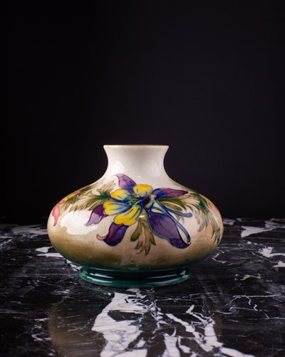 Lot 16 - A Walter Moorcroft 'Columbine' pattern vase,...