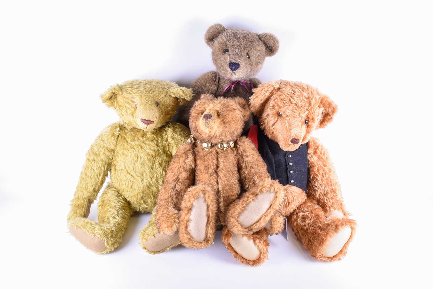 Lot 95 - Four large jointed teddy bears, to include...