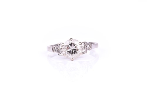 Lot 629 - A solitiare diamond ring, set with a round...