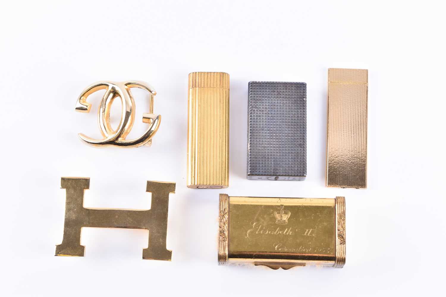 Lot 348 - A Cartier lighter, gilt metal, of ribbed...