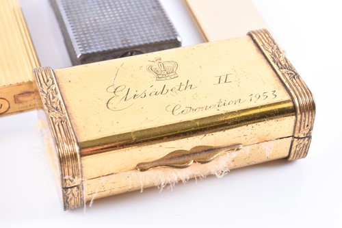 Lot 348 - A Cartier lighter, gilt metal, of ribbed...