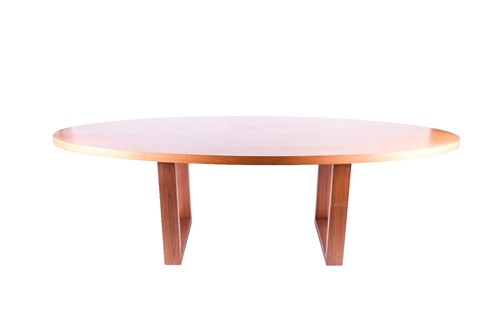Lot 104 - A large teak oval centre table, circa 1950s,...