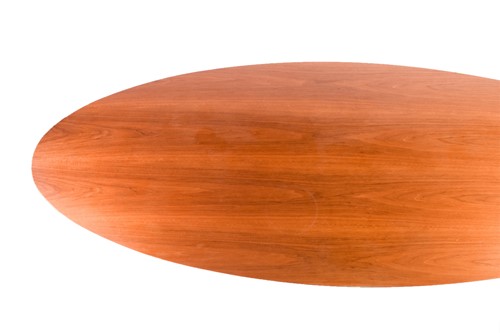 Lot 104 - A large teak oval centre table, circa 1950s,...