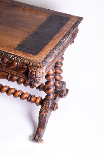 Lot 169 - A Victorian carved oak library table, the...