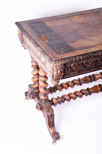 Lot 169 - A Victorian carved oak library table, the...